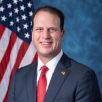 Texas Congressman Faces Intense Battle Against Gun-Toting YouTuber in High-Stakes Election