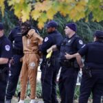 Teen Fatally Shot in Car; Suspect Taken into Custody