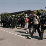 Los Angeles Police Launch Mass Arrests as Downtown Curfew Takes Effect