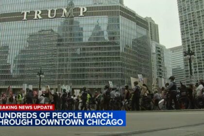ICE protest draws thousands to Chicago Loop; car plows through early on – CBS News