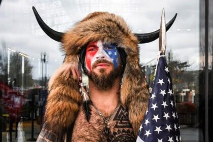 QAnon Shaman Blasts Trump and Demands 5 Just for a Conversation