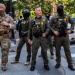Border Patrol Agents Shoot Armed Woman in Chicago Amid Tense Protest Confrontation