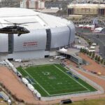 U. of Phoenix Stadium’s Retractable Field Slides Smoothly into Place for Super Bowl Showdown