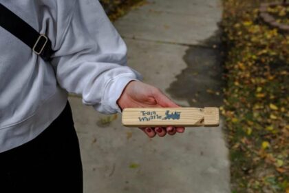 Plastic Whistles Emerge as a Powerful Symbol of Anti-ICE Resistance in Chicago
