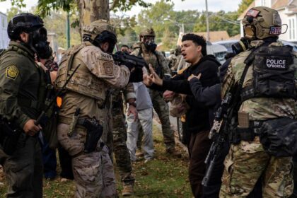 Judge orders federal immigration officers in Chicago area to wear body cameras – The Guardian